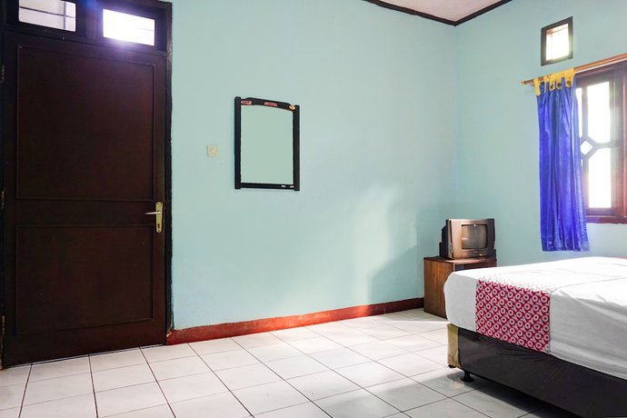 Imagen de la habitación del Hotel OYO 92997 Villa Hj Karnadi. Foto 3