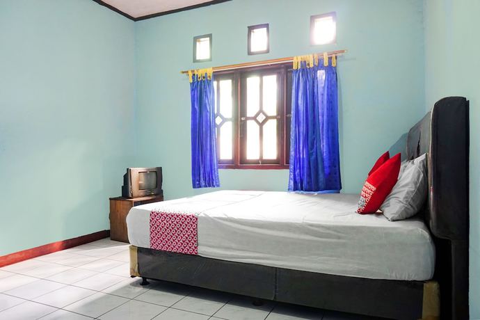 Imagen de la habitación del Hotel OYO 92997 Villa Hj Karnadi. Foto 4