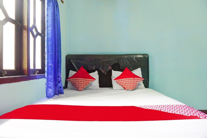Imagen de la habitación del Hotel OYO 92997 Villa Hj Karnadi. Foto 8