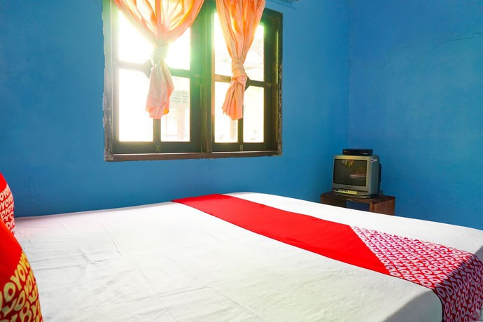 Imagen de la habitación del Hotel OYO 92997 Villa Hj Karnadi. Foto 9