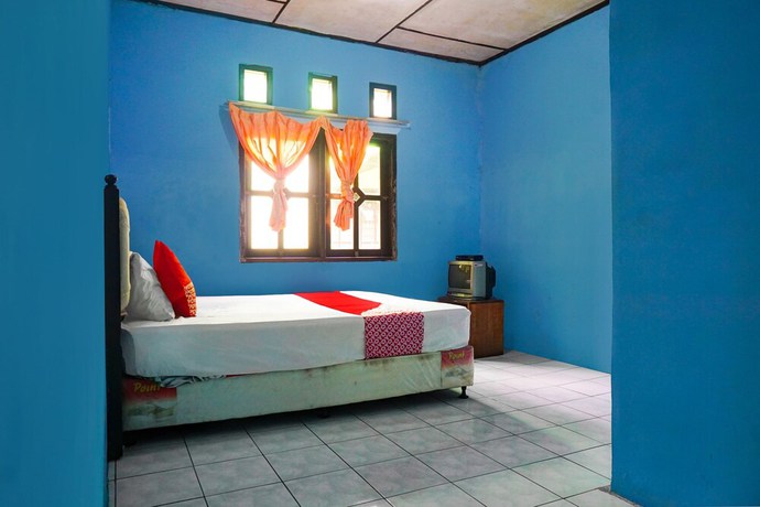 Imagen de la habitación del Hotel OYO 92997 Villa Hj Karnadi. Foto 10