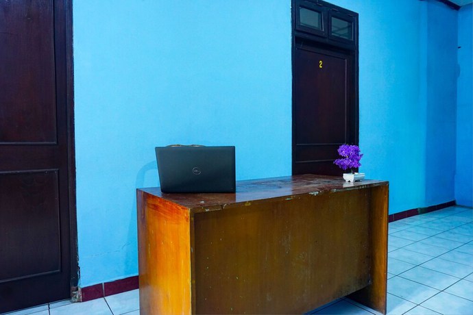 Imagen de los interiores del Hotel OYO 92997 Villa Hj Karnadi. Foto 13