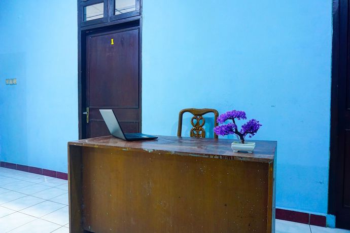 Imagen de los interiores del Hotel OYO 92997 Villa Hj Karnadi. Foto 15