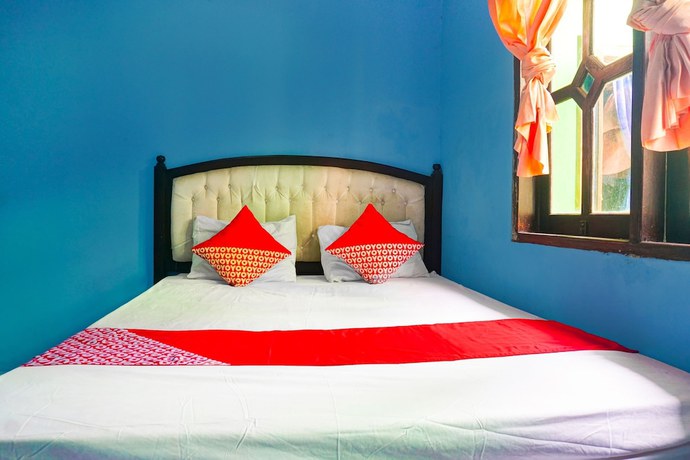 Imagen de la habitación del Hotel OYO 92997 Villa Hj Karnadi. Foto 11