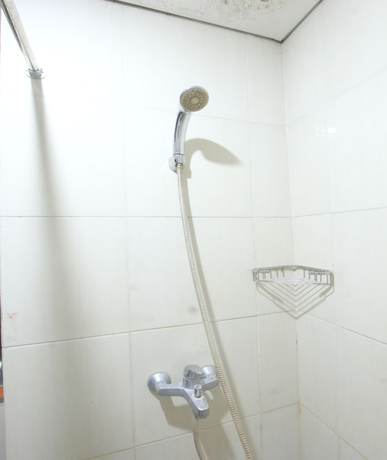 Imagen de la habitación del Hotel OYO 93002 Kost Gayus. Foto 8