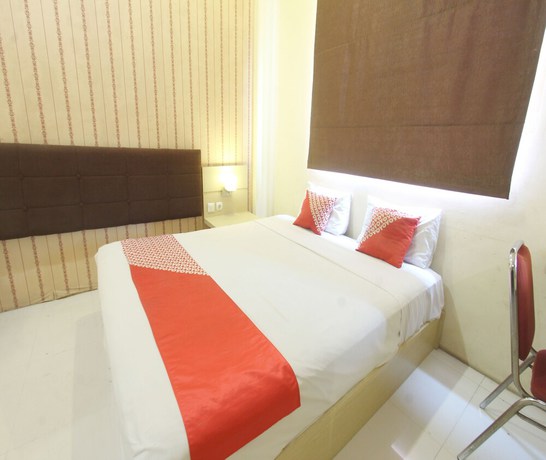 Imagen de la habitación del Hotel OYO 93002 Kost Gayus. Foto 10