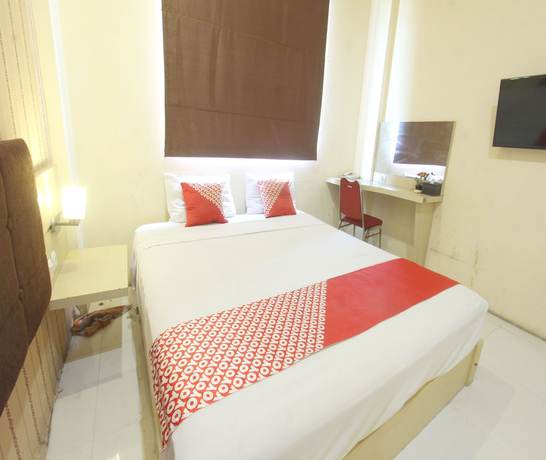 Imagen de la habitación del Hotel OYO 93002 Kost Gayus. Foto 11