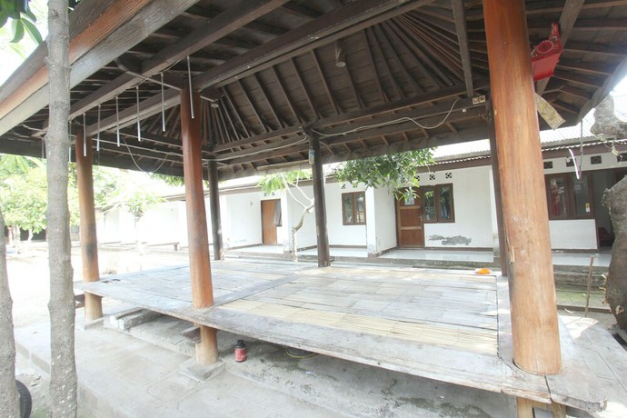 Imagen de los interiores del Hotel OYO 93002 Kost Gayus. Foto 13