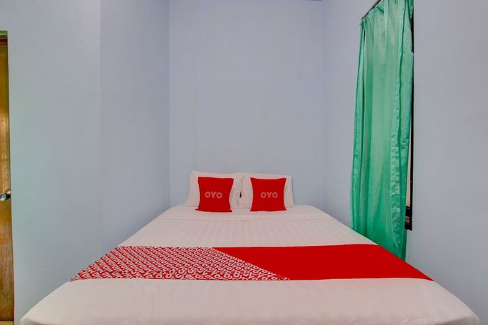 Imagen de la habitación del Hotel OYO 93012 Griya Kencana Asri Syariah. Foto 2