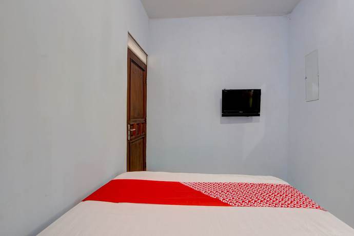 Imagen de la habitación del Hotel OYO 93012 Griya Kencana Asri Syariah. Foto 3