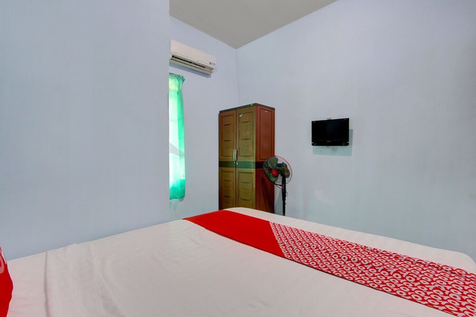 Imagen de la habitación del Hotel OYO 93012 Griya Kencana Asri Syariah. Foto 5