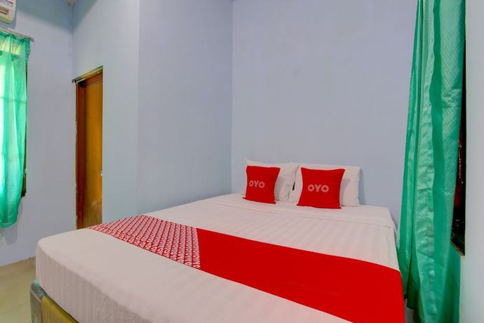 Imagen de la habitación del Hotel OYO 93012 Griya Kencana Asri Syariah. Foto 6