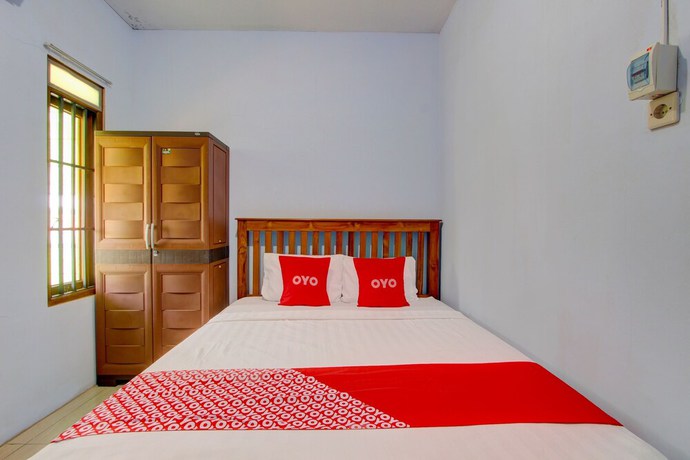 Imagen de la habitación del Hotel OYO 93012 Griya Kencana Asri Syariah. Foto 7