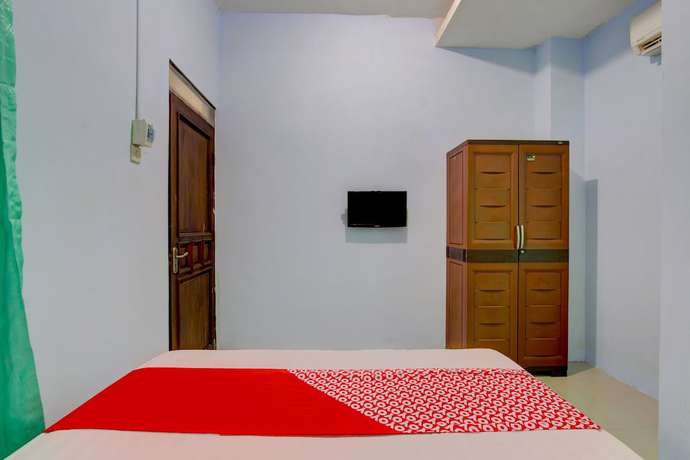 Imagen de la habitación del Hotel OYO 93012 Griya Kencana Asri Syariah. Foto 9