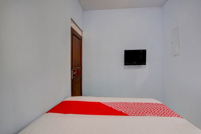 Imagen de la habitación del Hotel OYO 93012 Griya Kencana Asri Syariah. Foto 10