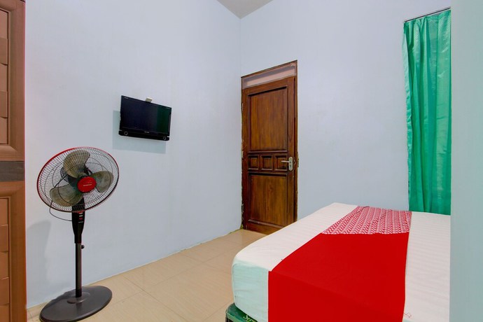 Imagen de la habitación del Hotel OYO 93012 Griya Kencana Asri Syariah. Foto 11