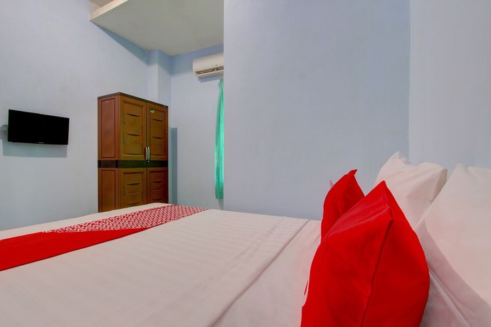 Imagen de la habitación del Hotel OYO 93012 Griya Kencana Asri Syariah. Foto 12