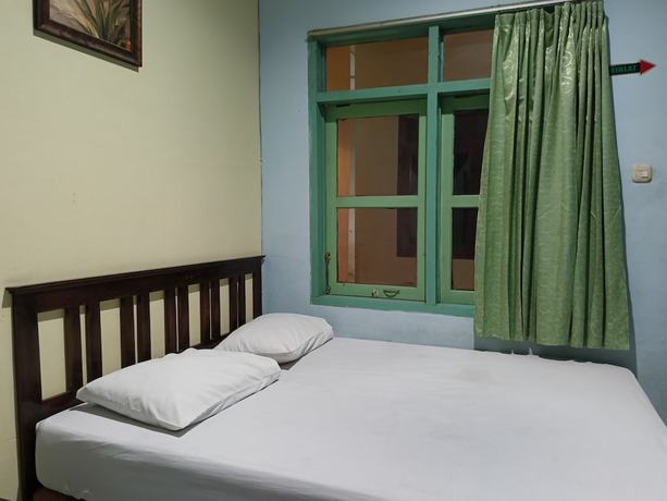 Imagen de la habitación del Hotel OYO 93046 Fortuna Parepare. Foto 4