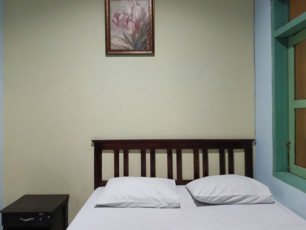 Imagen de la habitación del Hotel OYO 93046 Fortuna Parepare. Foto 6