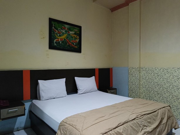 Imagen de la habitación del Hotel OYO 93046 Fortuna Parepare. Foto 9