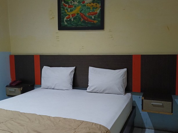 Imagen de la habitación del Hotel OYO 93046 Fortuna Parepare. Foto 10