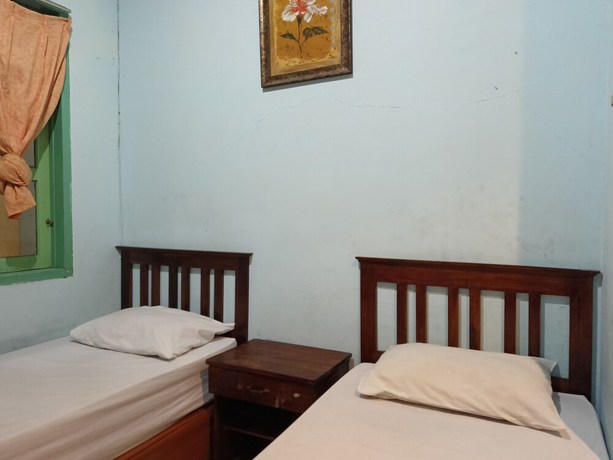 Imagen de la habitación del Hotel OYO 93046 Fortuna Parepare. Foto 12
