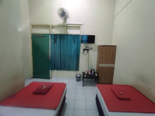 Imagen de la habitación del Hotel OYO 93048 Puri Mandiri. Foto 2