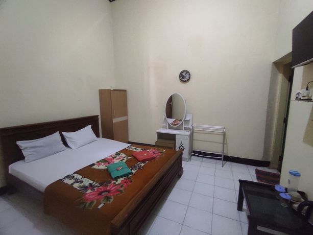 Imagen de la habitación del Hotel OYO 93048 Puri Mandiri. Foto 4