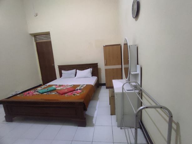 Imagen de la habitación del Hotel OYO 93048 Puri Mandiri. Foto 9