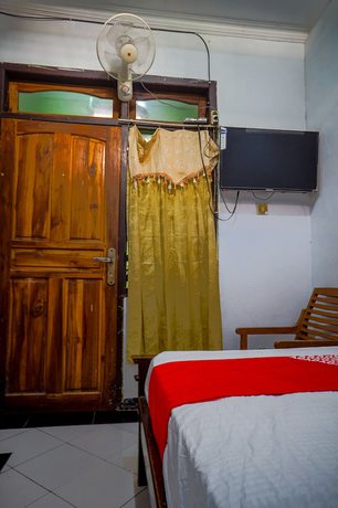 Imagen de la habitación del Hotel OYO 93069 Penginapan Sumber Rizki. Foto 3