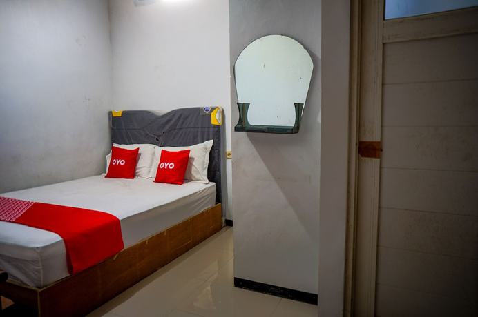 Imagen de la habitación del Hotel OYO 93069 Penginapan Sumber Rizki. Foto 8