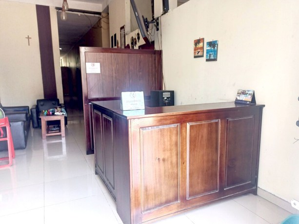 Imagen de los interiores del Hotel OYO 93073 Penginapan 69. Foto 6
