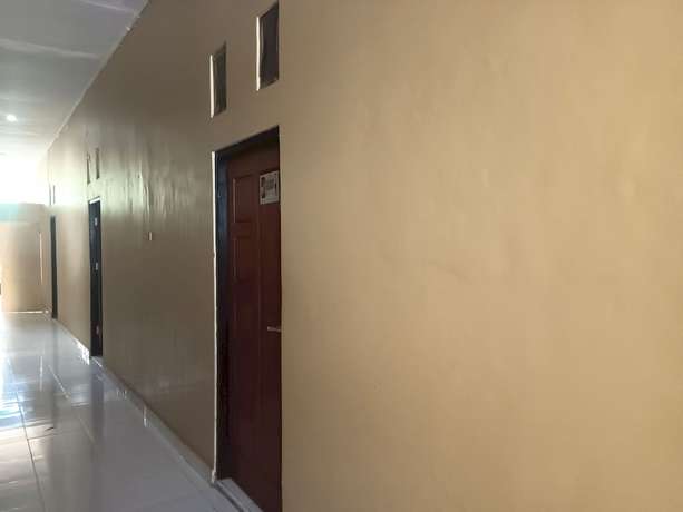 Imagen de los interiores del Hotel OYO 93073 Penginapan 69. Foto 11