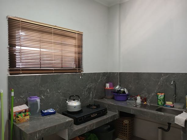 Imagen de los interiores del Hotel OYO 93085 Homy Stay Syariah. Foto 15