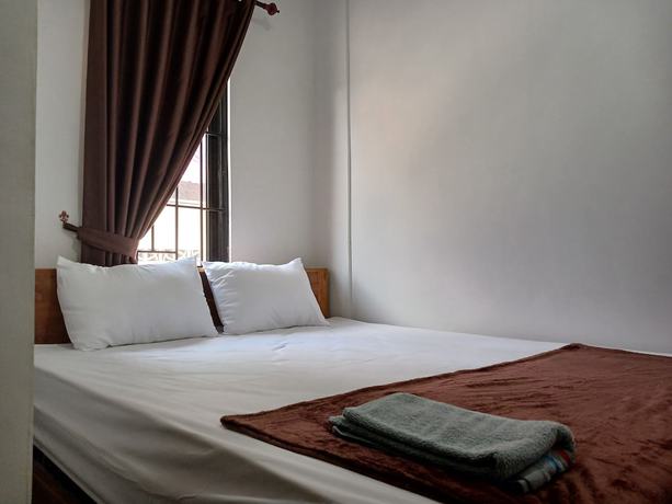 Imagen de la habitación del Hotel OYO 93085 Homy Stay Syariah. Foto 3