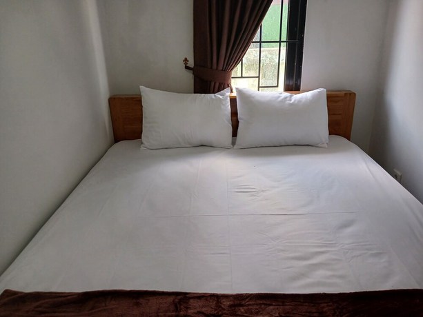 Imagen de la habitación del Hotel OYO 93085 Homy Stay Syariah. Foto 6