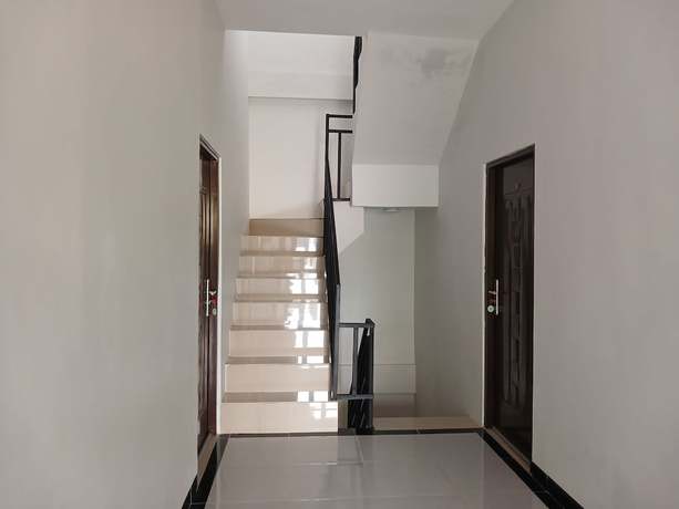 Imagen de los interiores del Hotel OYO 93085 Homy Stay Syariah. Foto 19