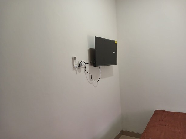Imagen de la habitación del Hotel OYO 93085 Homy Stay Syariah. Foto 9
