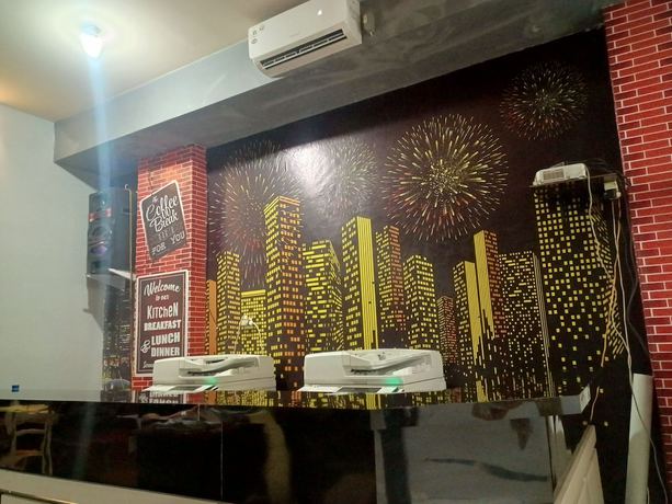 Imagen de los interiores del Hotel OYO 93090 Multi Plus Inn. Foto 6