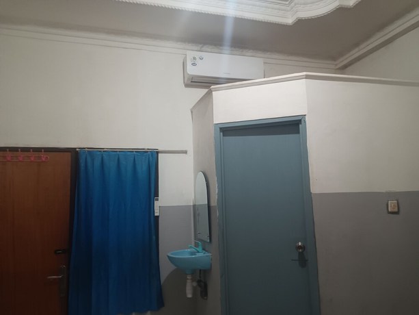 Imagen de la habitación del Hotel OYO 93090 Multi Plus Inn. Foto 2