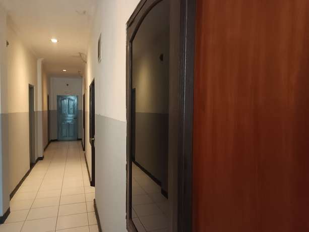Imagen de los interiores del Hotel OYO 93090 Multi Plus Inn. Foto 8