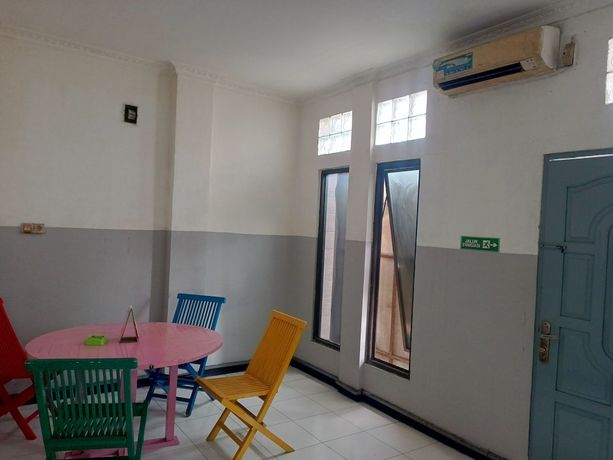 Imagen de los interiores del Hotel OYO 93090 Multi Plus Inn. Foto 11