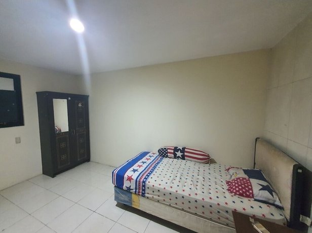 Imagen de la habitación del Hotel OYO 93112 Garden Homestay 3 Merlion. Foto 8