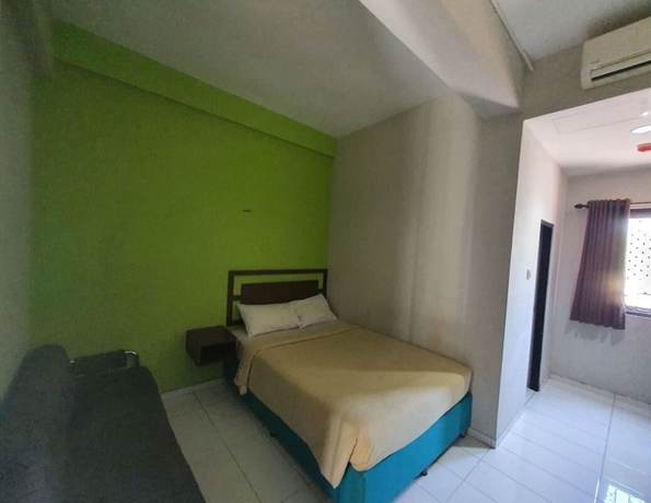 Imagen de la habitación del Hotel OYO 93112 Garden Homestay 3 Merlion. Foto 12