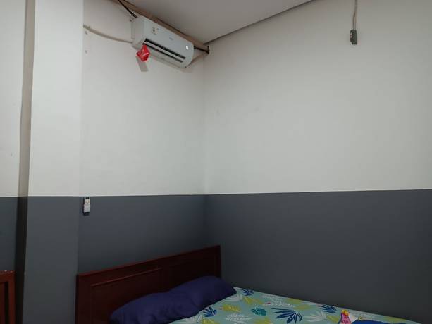 Imagen de la habitación del Hotel OYO 93117 Penginapan Tiga Dara. Foto 5