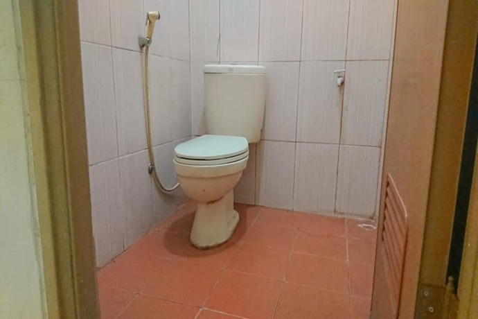 Imagen de la habitación del Hotel OYO 93117 Penginapan Tiga Dara. Foto 6