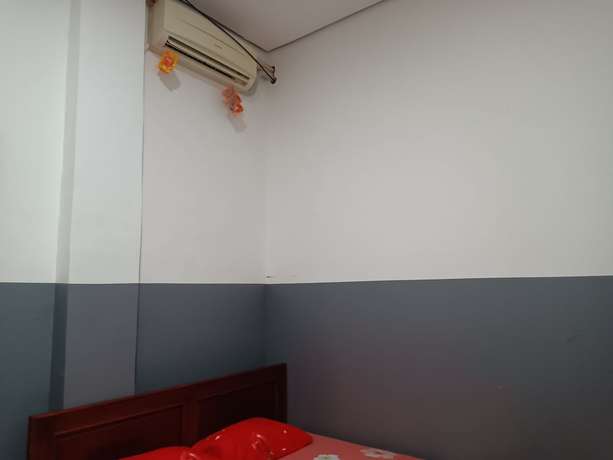 Imagen de la habitación del Hotel OYO 93117 Penginapan Tiga Dara. Foto 8