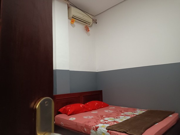 Imagen de la habitación del Hotel OYO 93117 Penginapan Tiga Dara. Foto 10
