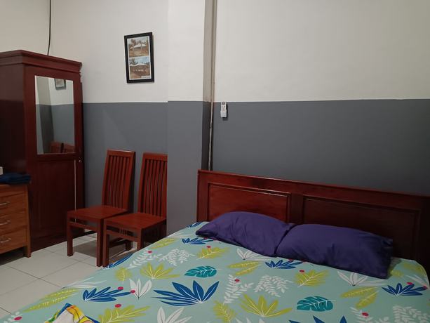 Imagen de la habitación del Hotel OYO 93117 Penginapan Tiga Dara. Foto 11