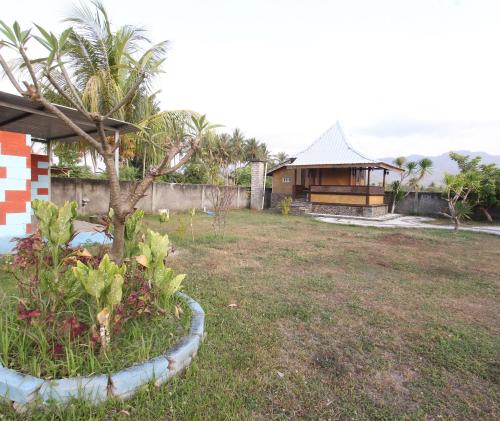 Imagen general del Hotel OYO 93121 Abi Bungalow & Hostel. Foto 9